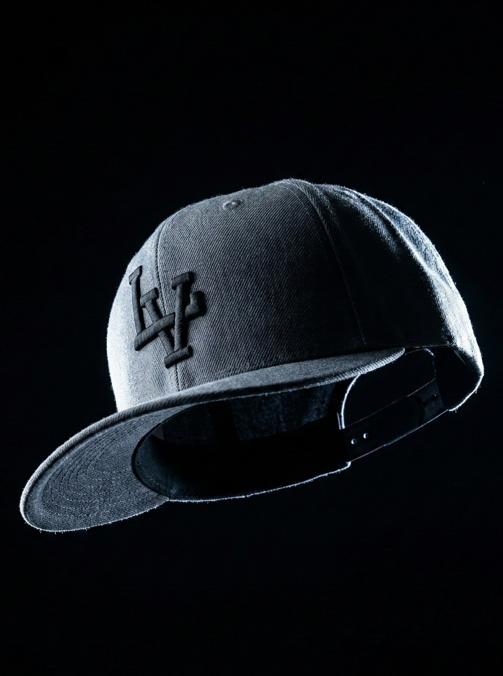 Gray cap with a logo on a black background
