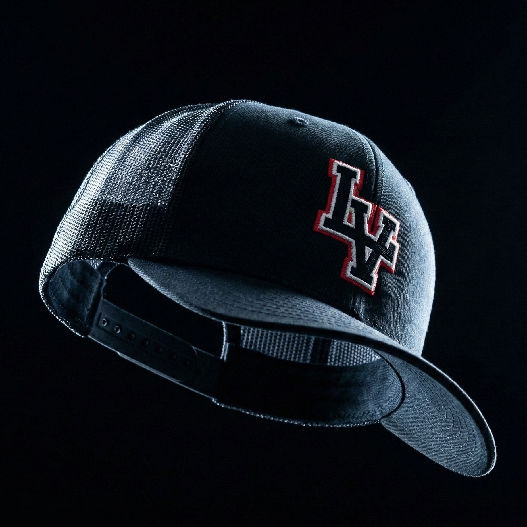 Black cap with an LV logo on a black background
